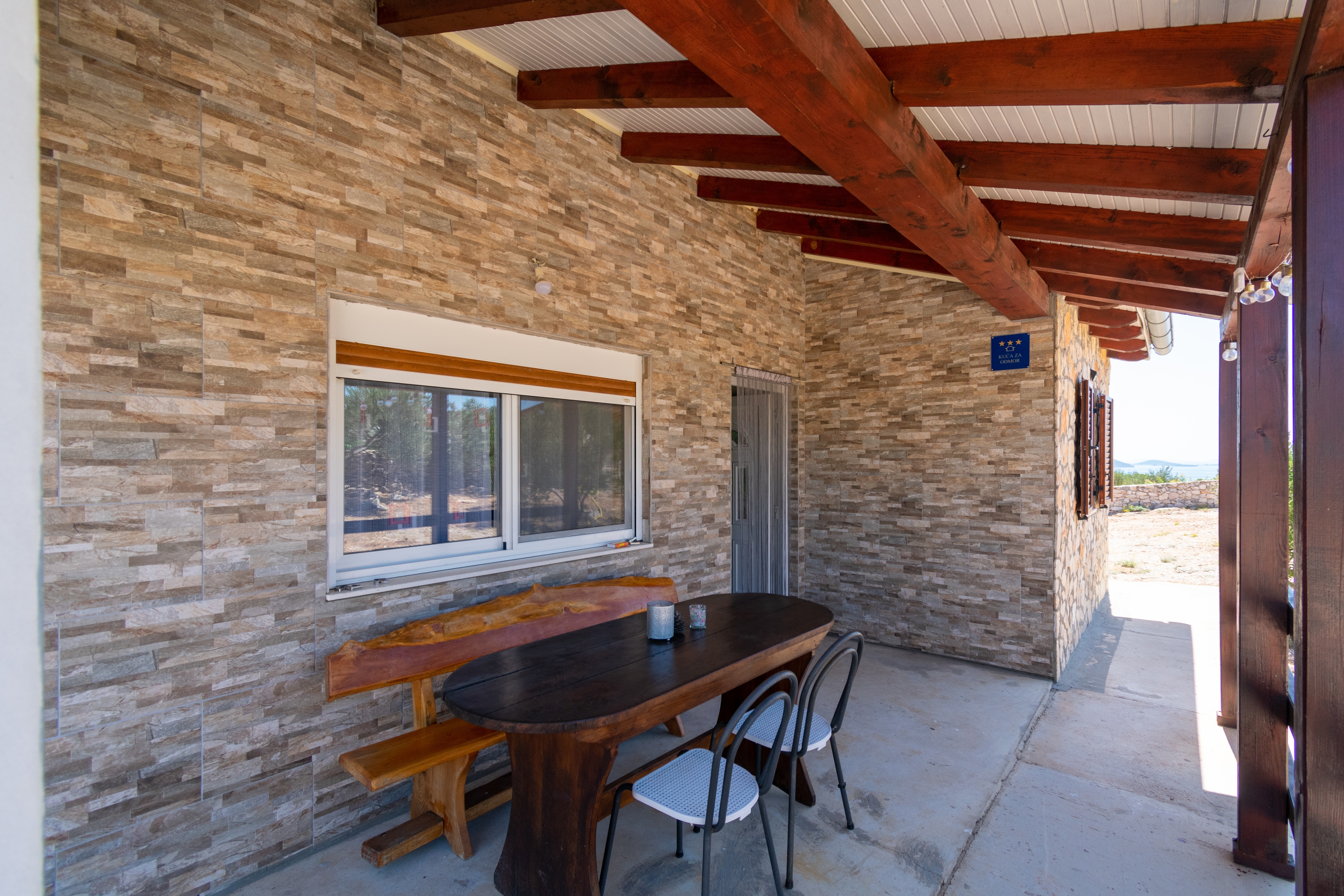 Two bedroom house with terrace and sea view Cove Triluke, Pašman  K