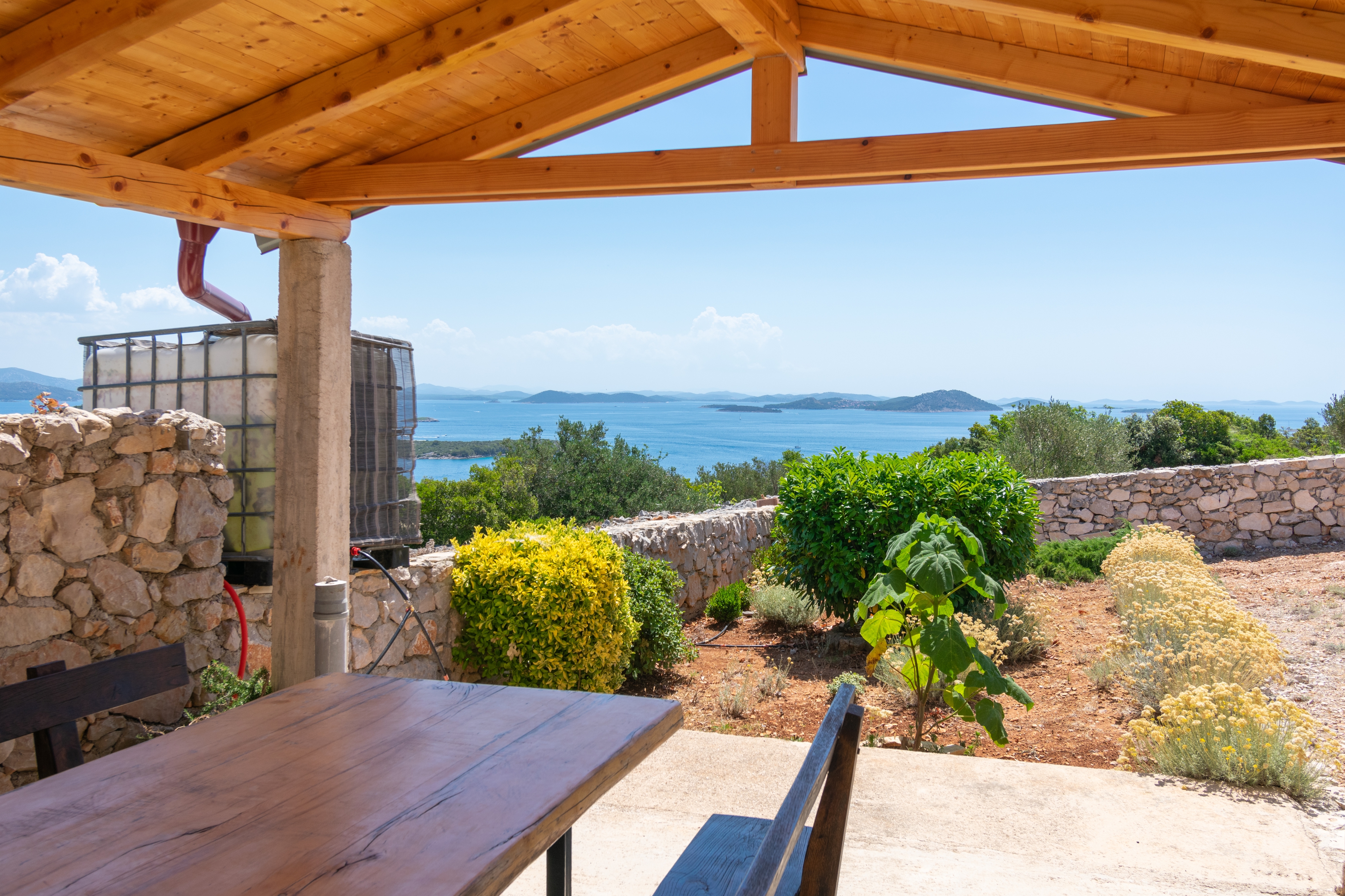 Two bedroom house with terrace and sea view Cove Triluke, Pašman  K