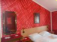 Ložnice Rovinj, Ložnice v ubytování typu room, s klimatizací a WiFi.