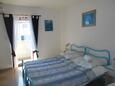 Ložnice Rovinj, Ložnice v ubytování typu room, s klimatizací a WiFi.