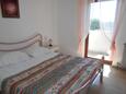 Ložnice Rovinj, Ložnice v ubytování typu room, s klimatizací a WiFi.