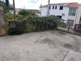Parking lot Trogir, Trogir, Parking lot 13623 - Apartments near sea with pebble beach.