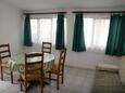 Dining room Srima - Vodice, Dining room in the apartment, air condition available, (pet friendly) and WiFi.