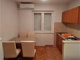 Dining room Tučepi, Dining room in the apartment, air condition available and WiFi.