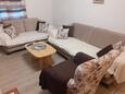Vodice, Obývací pokoj v ubytování typu apartment, s klimatizací a WiFi.