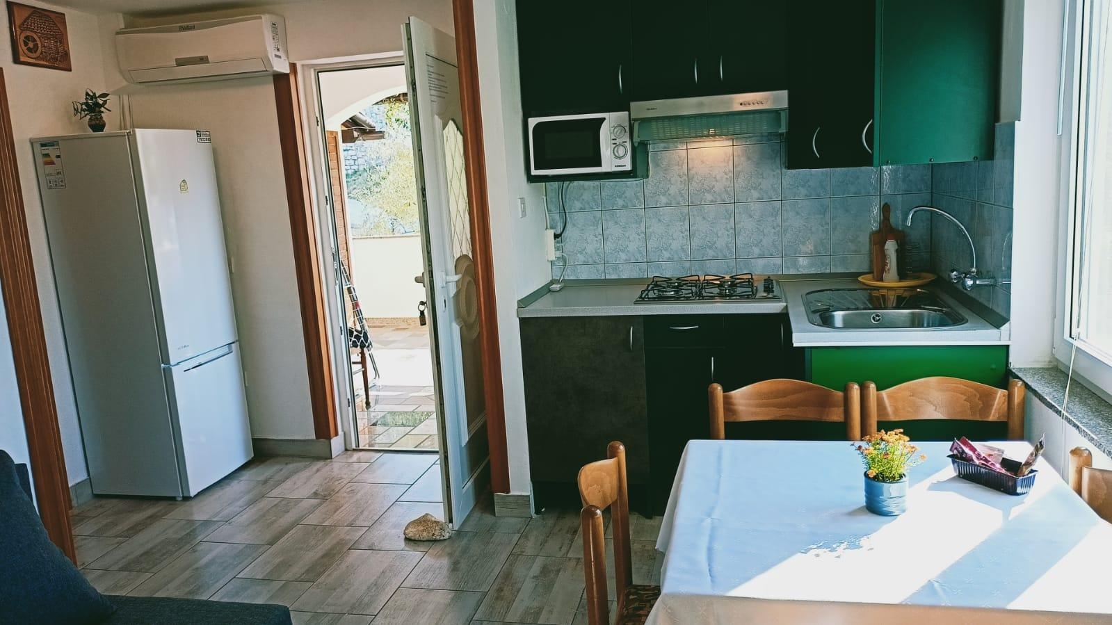 Two bedroom apartment with terrace and sea view Vinjerac, Zadar  A-c