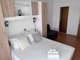 Lopar, Ložnice 1 v ubytování typu apartment, domácí mazlíčci povoleni a WiFi.