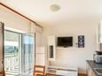 Lopar, Jídelna v ubytování typu apartment, s klimatizací, domácí mazlíčci povoleni a WiFi.