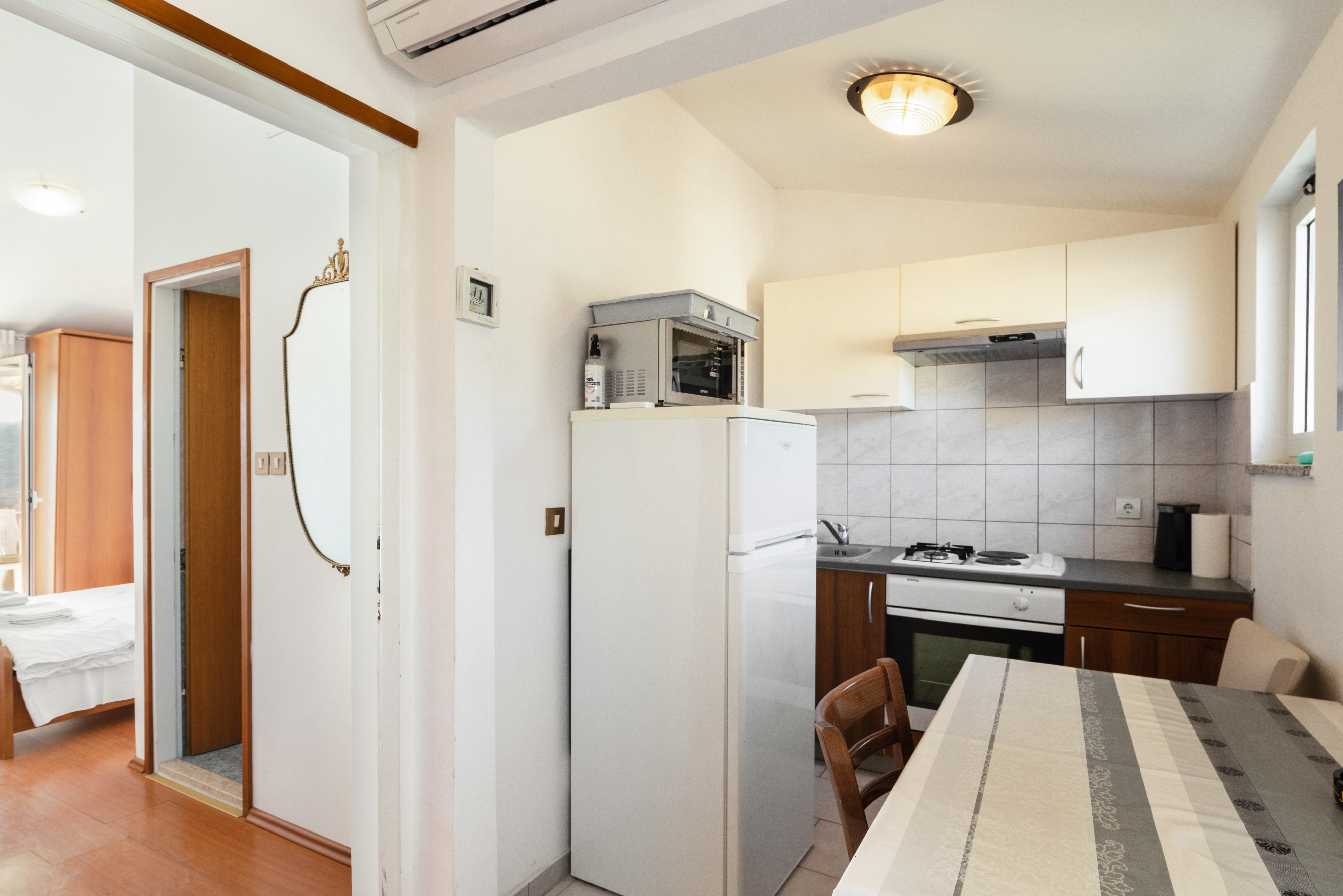 Top Rab Lopar Top Rab Lopar