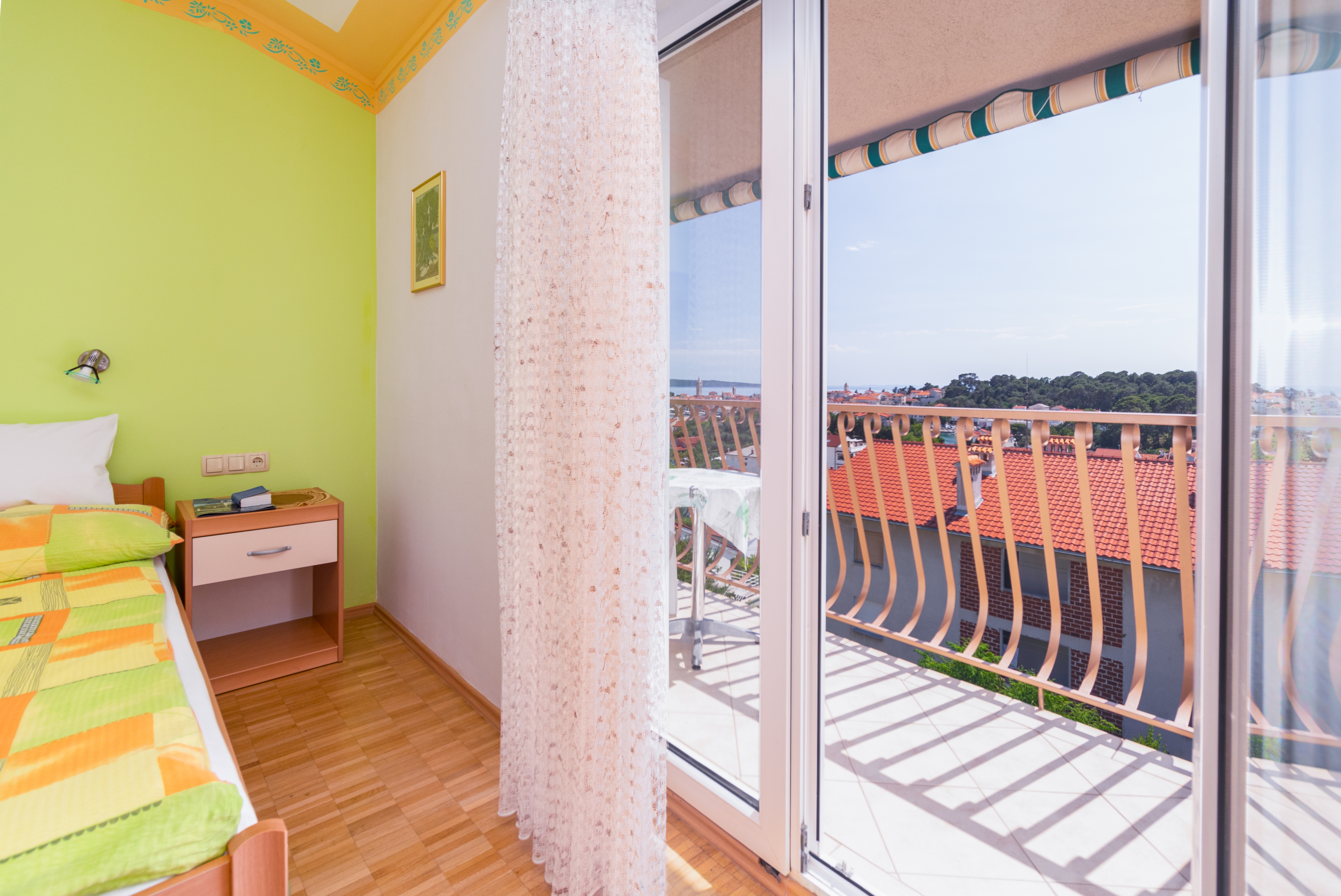 Two bedroom apartment with balcony and sea view Rab  A-c