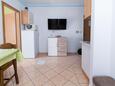 Rab, Jídelna v ubytování typu apartment, s klimatizací a WiFi.
