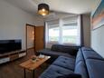 Obývací pokoj Ljubač, Obývací pokoj v ubytování typu apartment, s klimatizací a WiFi.