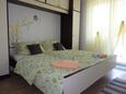 Spavaća soba 2 Supetarska Draga - Donja, Spavaća soba 2 u smještaju tipa apartment, WiFi.
