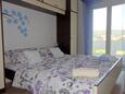 Spavaća soba 3 Supetarska Draga - Donja, Spavaća soba 3 u smještaju tipa apartment, WiFi.
