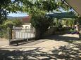 Parking lot Marina, Trogir, Parking lot 14191 - Apartments near sea with pebble beach.