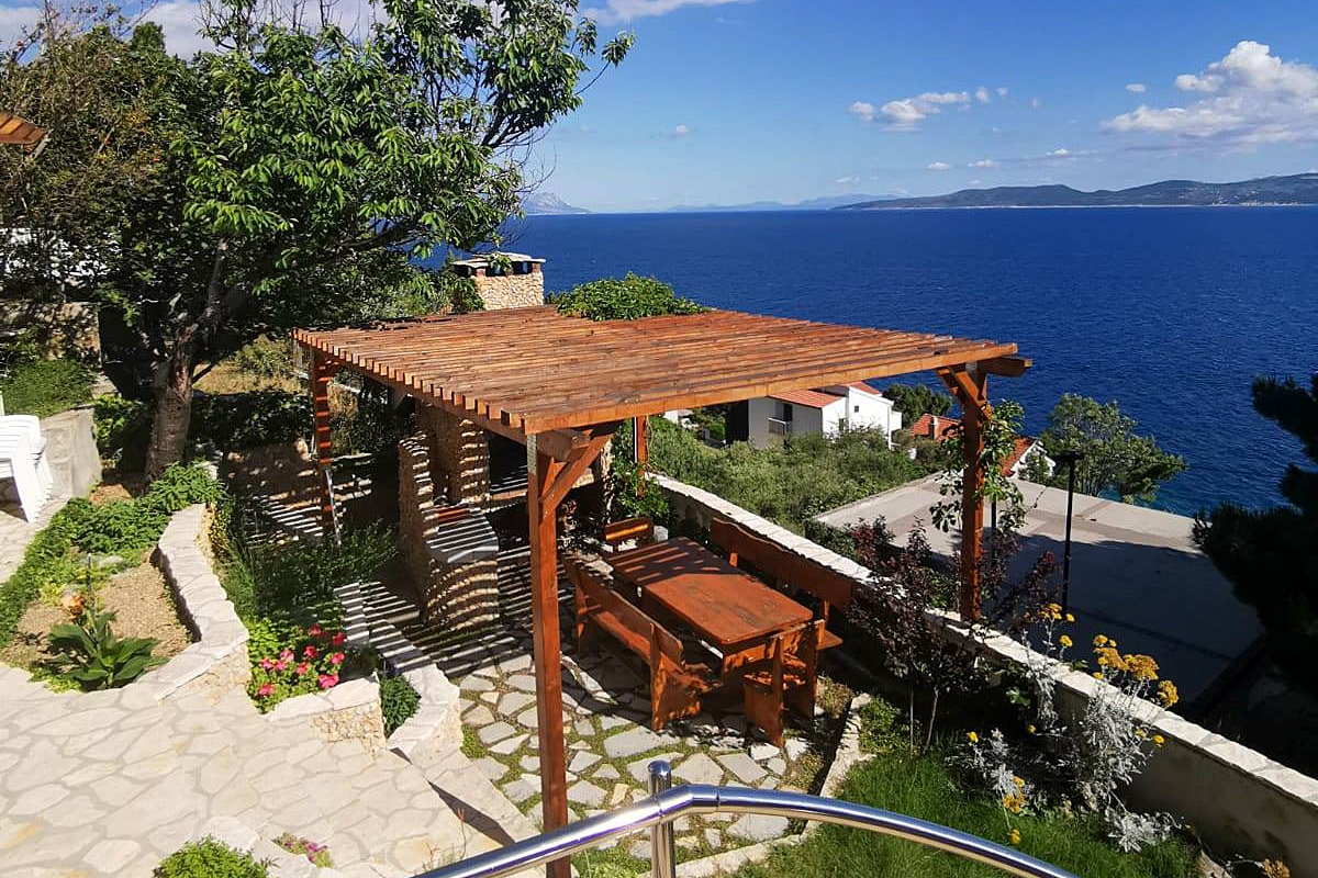 Two bedroom apartment with terrace and sea view Mimice (Omiš) (A-14230-b)