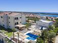 Szálláshely Novalja, Pag, Szálláshely 14274 - Apartmanok homokos stranddal.