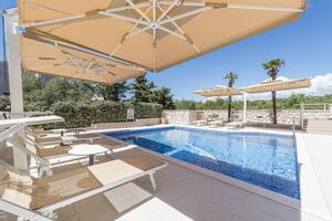 Family friendly apartments with a swimming pool Novalja, Pag - 14275