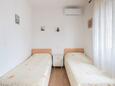 Ložnice Hvar, Ložnice v ubytování typu studio-apartment, klimatizácia k dispozícii a WiFi.