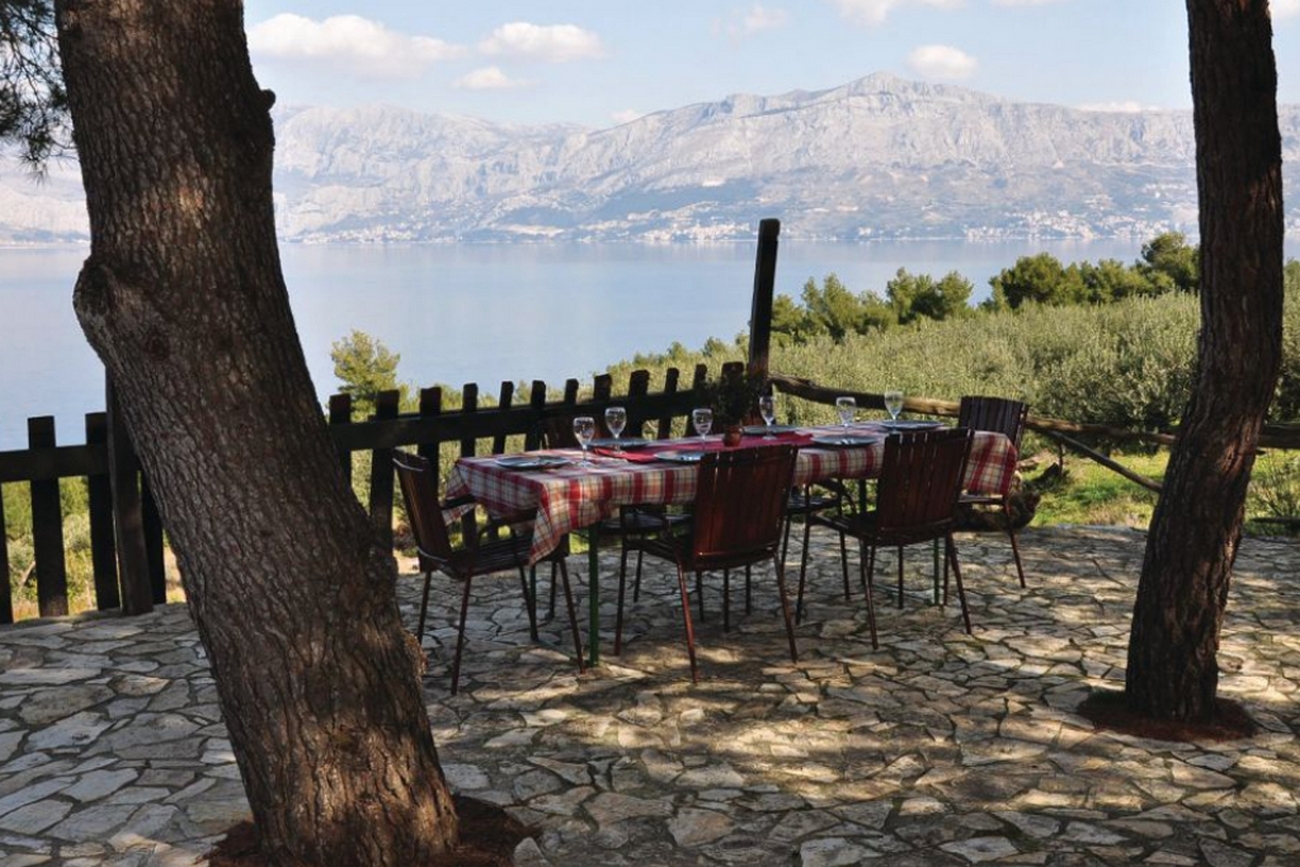 Two bedroom house with terrace and sea view Cove Dučac, Brač  K