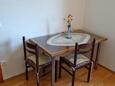 Dining room Prižba, Dining room in the studio-apartment, air condition available, (pet friendly) and WiFi.