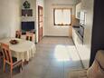 Dining room Povlja, Dining room in the apartment, air condition available, (pet friendly) and WiFi.