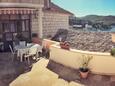 Terrace Povlja, Terrace in the apartment, with a sea view, (pet friendly) and WiFi.