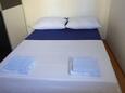 Slaapkamer Tisno, Slaapkamer in the apartment, (pet friendly) en WiFi.