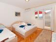 Bedroom Omiš, Bedroom in the apartment, air condition available and WiFi.
