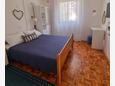 Sabunike, Bedroom in the apartment, air condition available and WiFi.