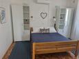 Sabunike, Bedroom in the apartment, air condition available and WiFi.