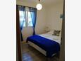 Spavaća soba 1 Maslinica, Spavaća soba 1 u smještaju tipa apartment, kućni ljubimci dozvoljeni i WiFi.