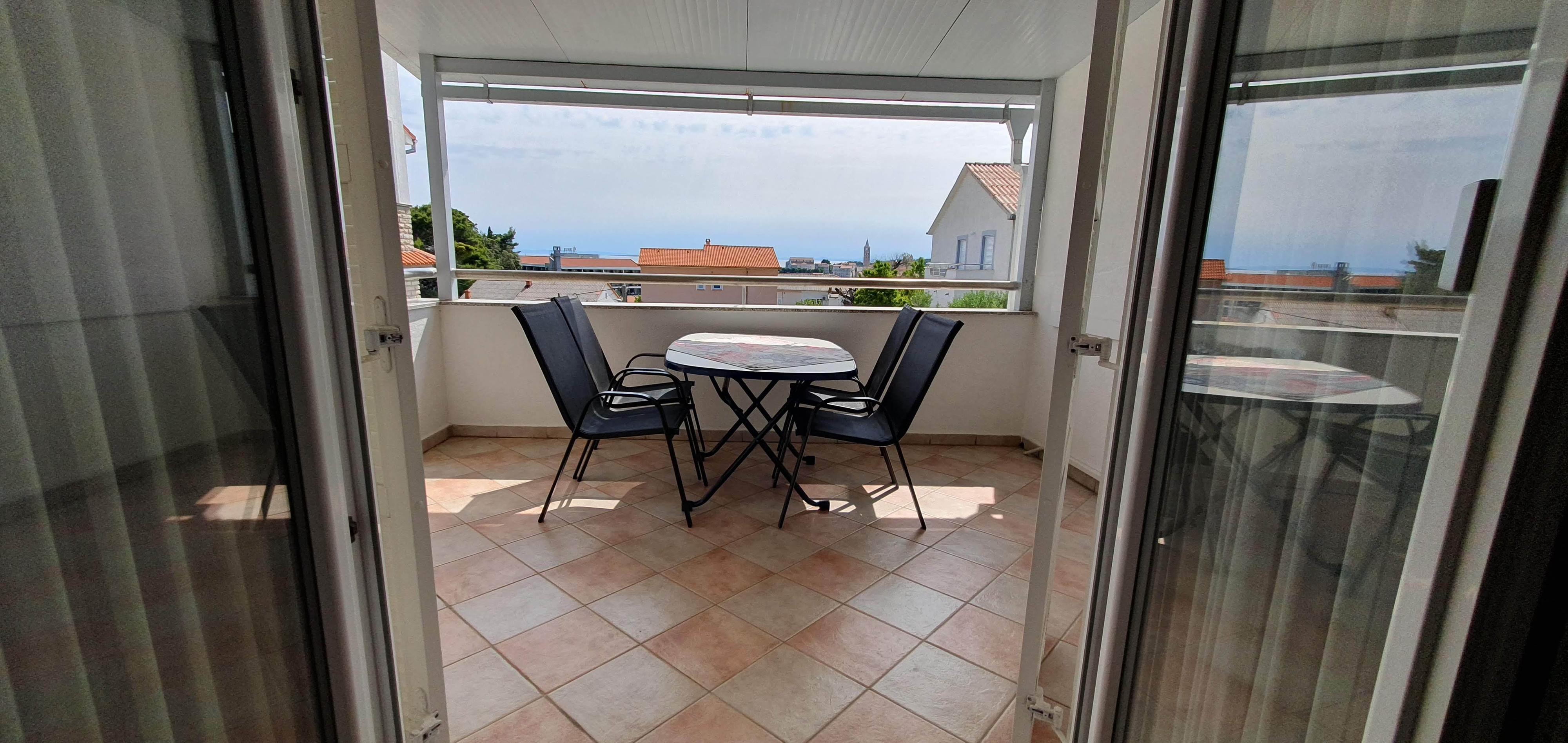Two bedroom apartment with terrace and sea view Rab  A-a