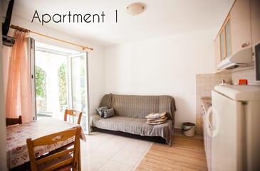Lopar, Jídelna v ubytování typu apartment, s klimatizací a WiFi.