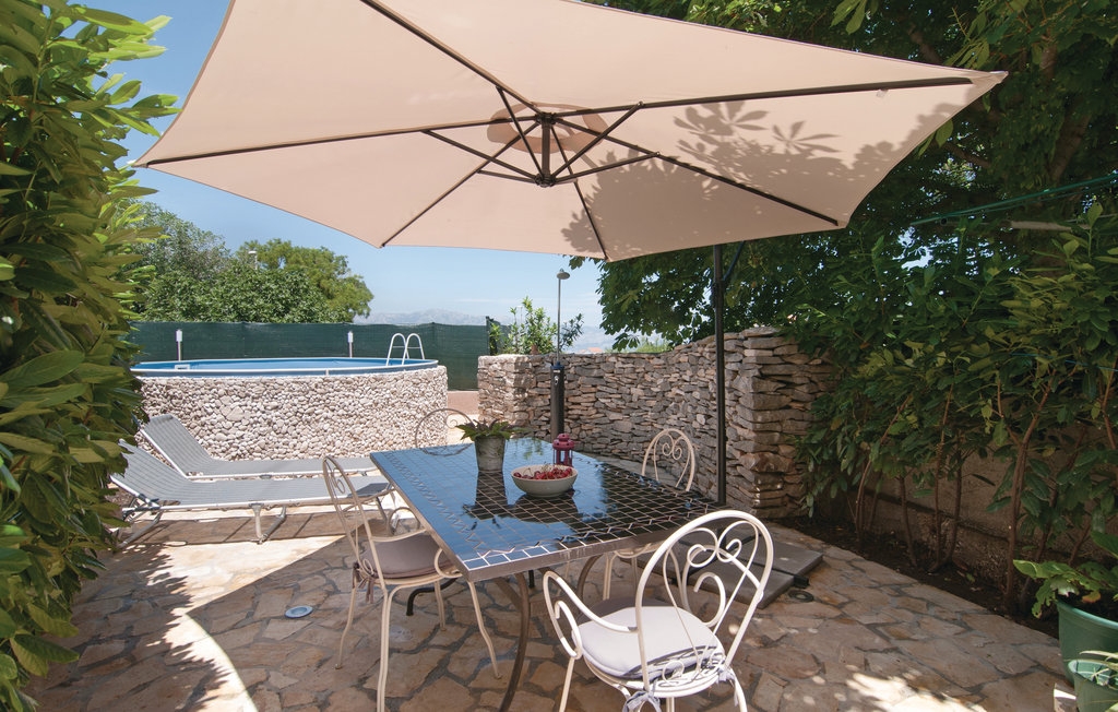 Two bedroom house with terrace and sea view Škrip, Brač (K-15100) Two bedroom house with terrace and sea view Škrip, Brač (K-15100)