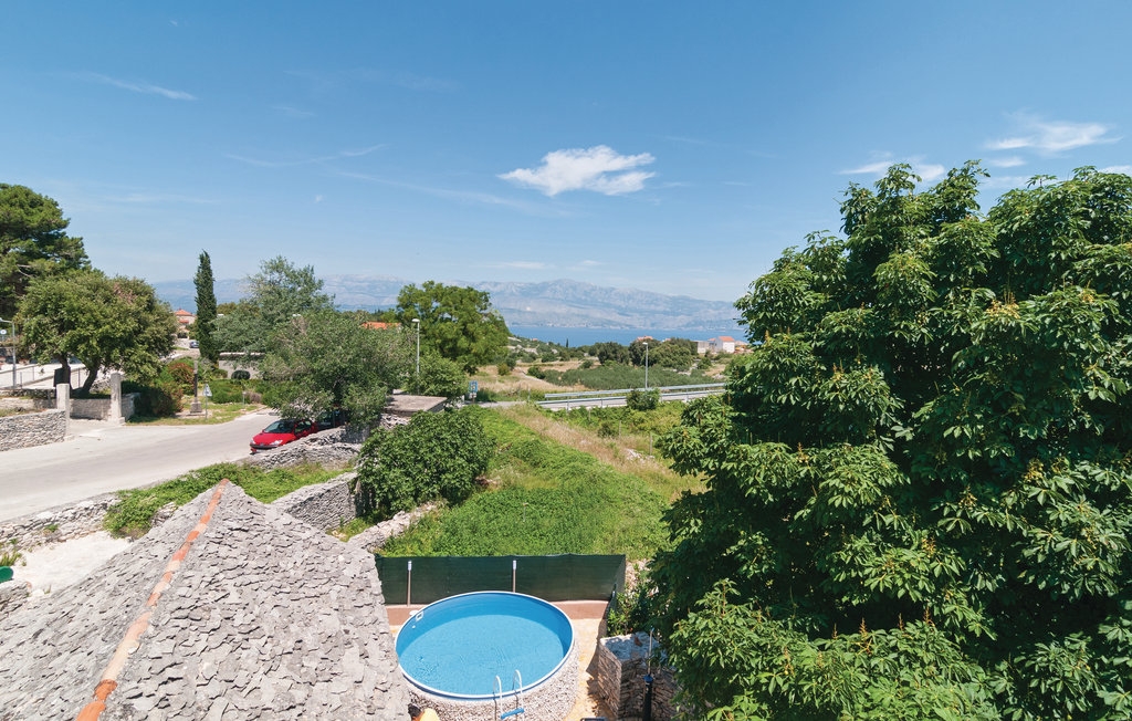 Two bedroom house with terrace and sea view Škrip, Brač  K