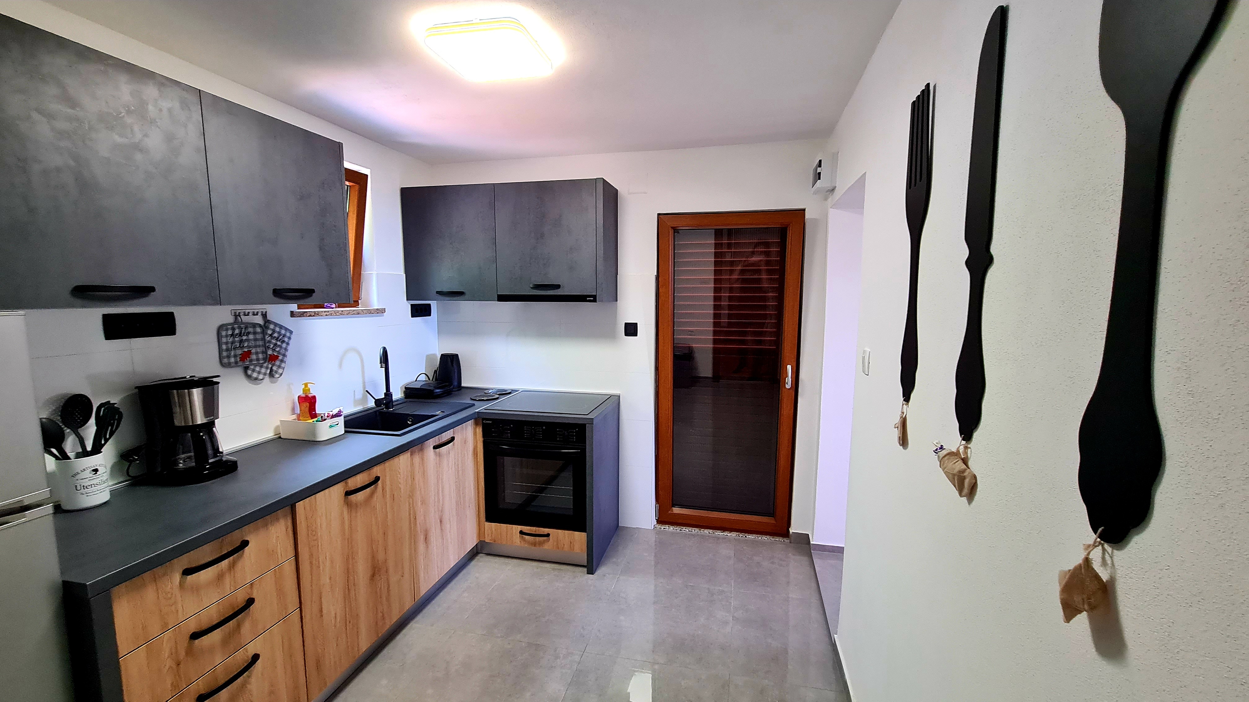Two bedroom house with terrace and sea view Milovac, Paklenica  K