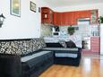 Obývací pokoj Makarska, Obývací pokoj v ubytování typu apartment, s klimatizací a WiFi.