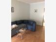 Obývací pokoj Pinezići, Obývací pokoj v ubytování typu apartment, s klimatizací a WiFi.