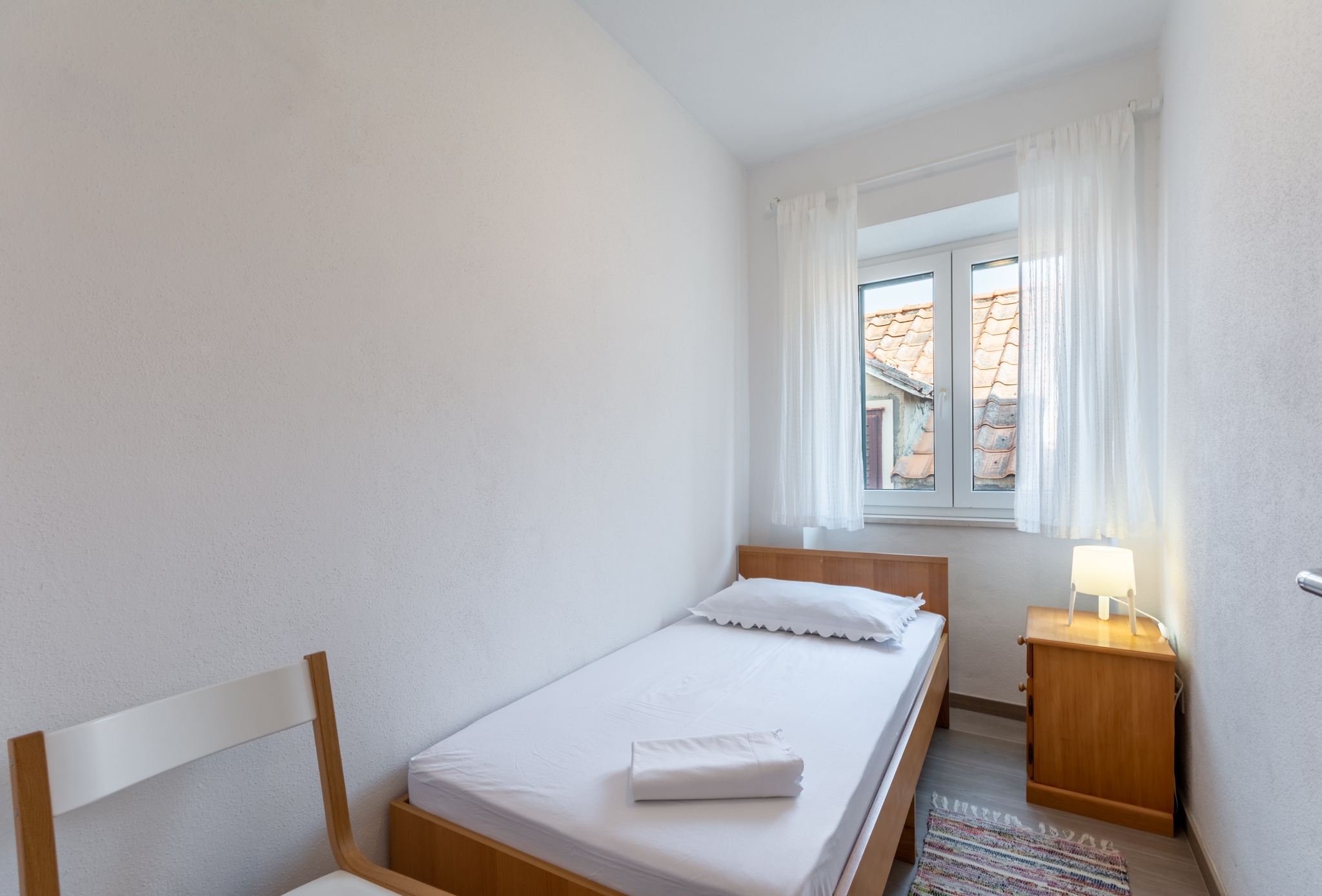 Two bedroom apartment with balcony and sea view Pučišća, Brač  A-a