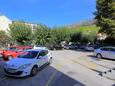 Parking lot Dugi Rat, Omiš, Parking lot 15516 - Apartments near sea with pebble beach.