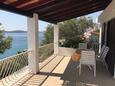 Terrace 2 Kaprije, Terrace 2 in the apartment, with a sea view and WiFi.