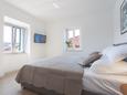 Bedroom 1 Makarska, Bedroom 1 in the apartment, air condition available and WiFi.