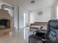 Living room Sutivan, Living room in the apartment, air condition available, (pet friendly) and WiFi.