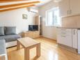 Living room Sutivan, Living room in the apartment, air condition available, (pet friendly) and WiFi.