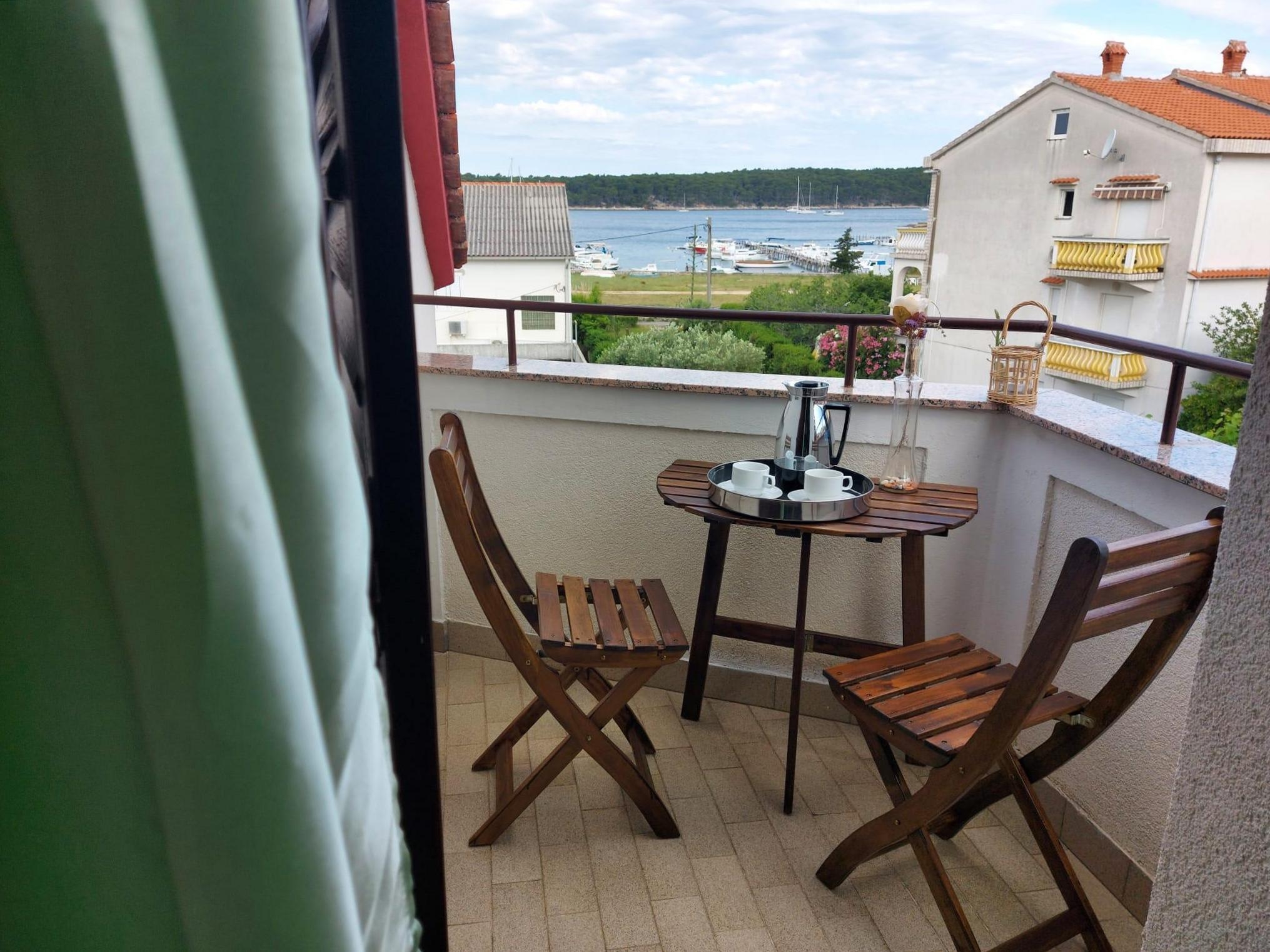 One bedroom apartment with terrace and sea view Palit, Rab (A-15794-b) One bedroom apartment with terrace and sea view Palit, Rab (A-15794-b)