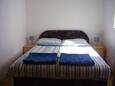 Nin, Dormitorio in the apartment, air condition available y WiFi.