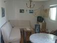 Living room Nin, Living room in the apartment, air condition available and WiFi.