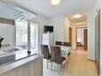 Столовая Vrsi, Столовая в размещении типа apartment, доступный кондиционер и WiFi.