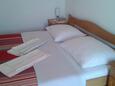 Sobra, Bedroom in the studio-apartment, air condition available and WiFi.